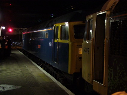 Changing engines at New Street - 47270 and 56312 prepare to depart